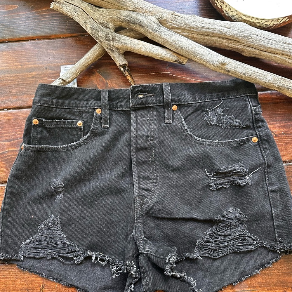 Levi’s 501s Distressed Black Denim Shorts